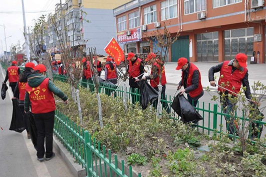 汊涧镇开展捡烟头、捡垃圾志愿者服务活动-